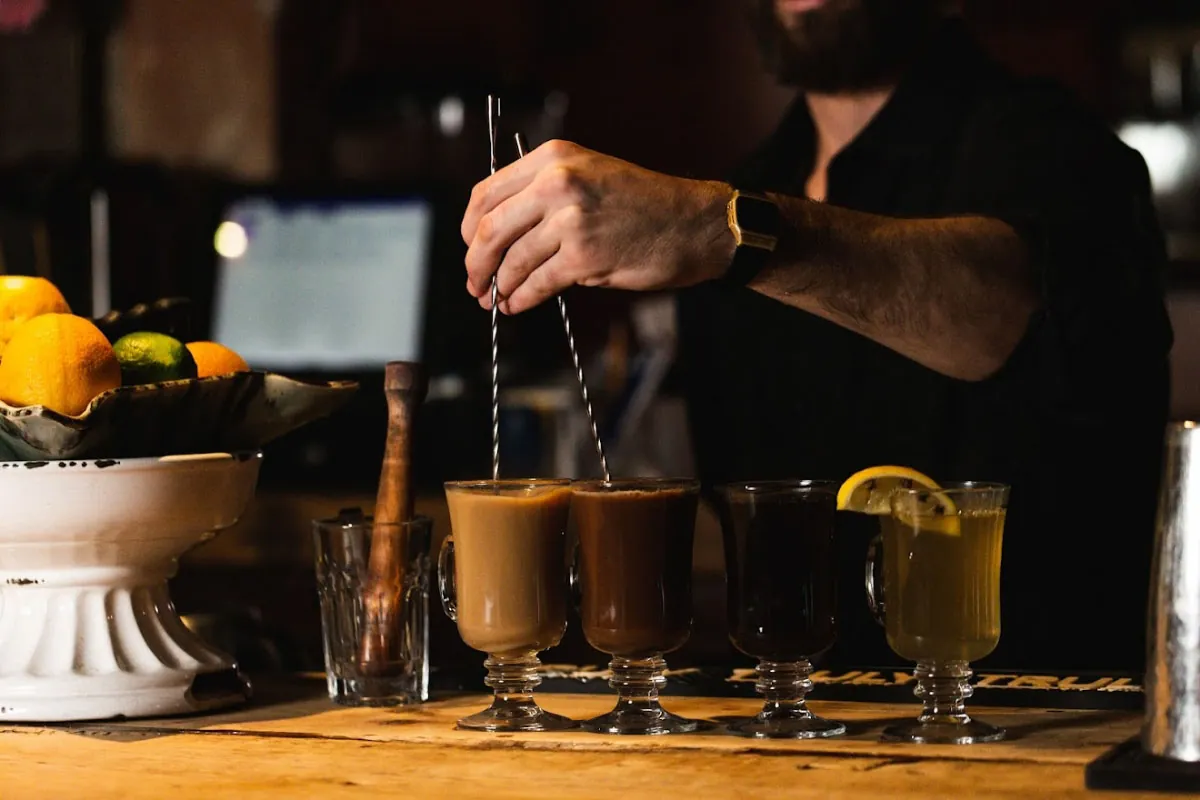 A bartender making cocktails at Juke Bar