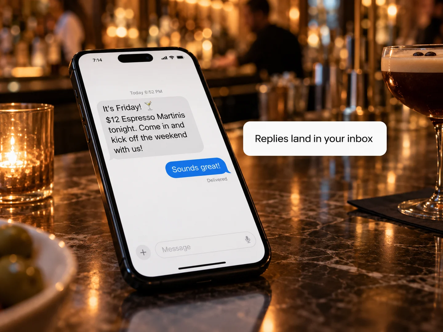 A text from the restaurant about tonight’s special on a phone at the bar, with the guest replying