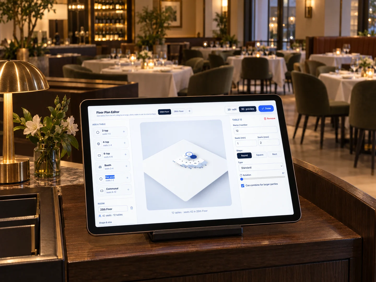 The DerbyFlow floor plan editor on a tablet in a dining room